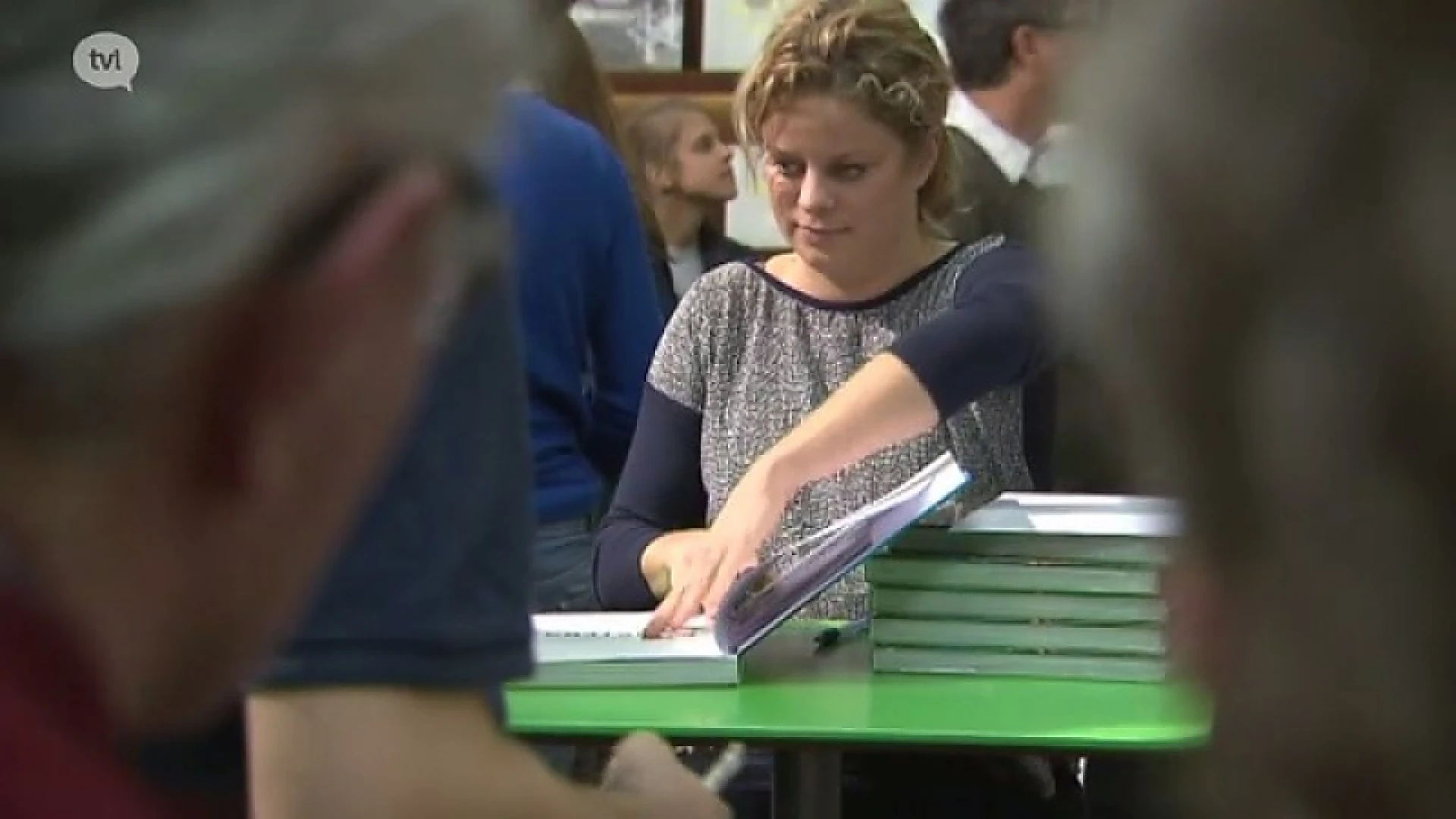 Kim Clijsters signeert op de boekenbeurs