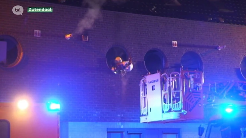 Vrouw van dak brandend huis gered in Zutendaal