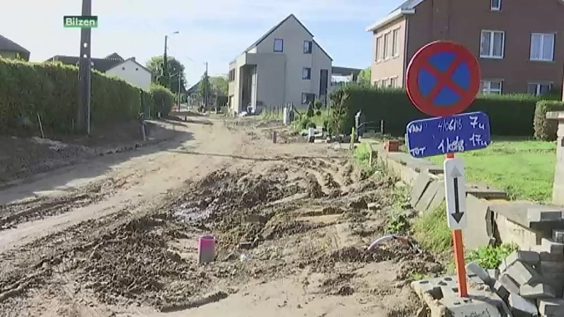 Buurt in Bilzen onbereikbaar door financiële problemen aannemer