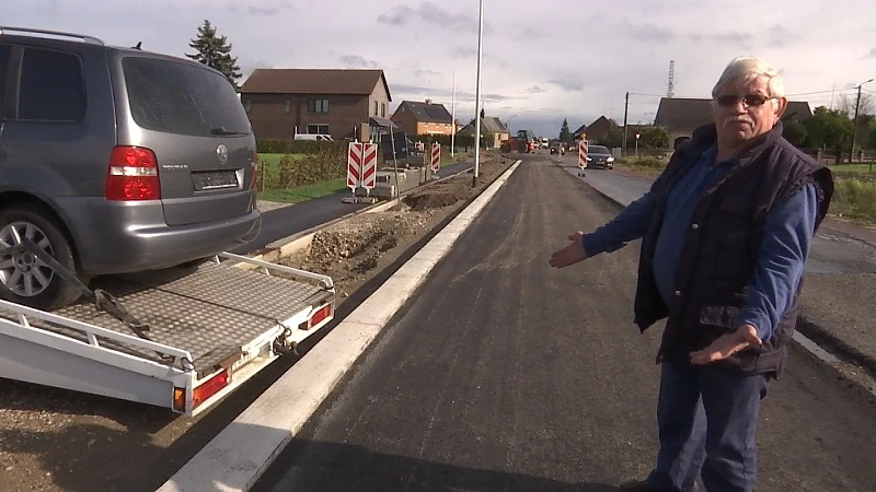 Autoverkoper geraakt niet meer van zijn inrit door verhoogde weg in Bree