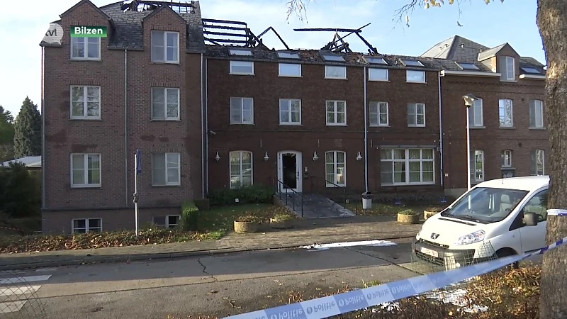 Omstaanders juichen brand asielcentrum toe