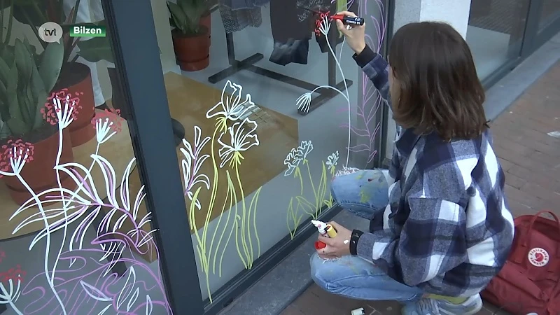 Bilzerse illustrator fleurt etalages op in opdracht van stad