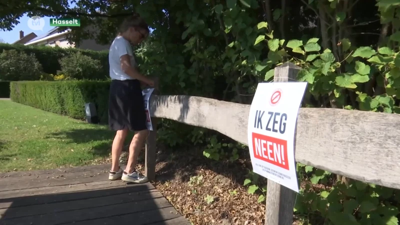 Buurtbewoners trekken de straat op om te protesteren tegen leidingstraat in Hasselt