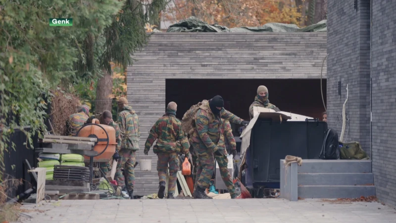 Militairen kammen tuin in Genk uit tijdens huiszoeking