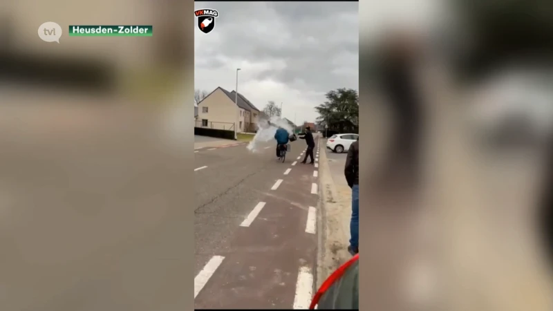 Garagist gooit emmer water op spuwende fietser