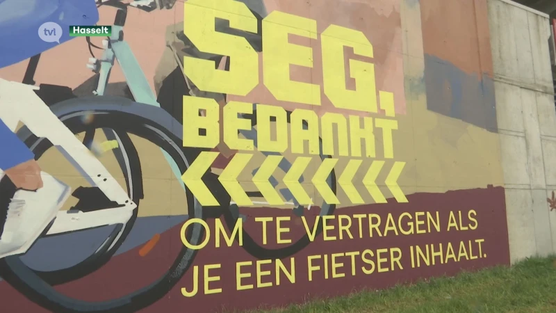 Lydia Peeters onthult graffitikunstwerk dat fietsveiligheid moet verbeteren