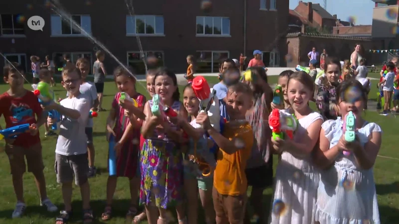 Waterspelletjes als antwoord op de hittegolf in Bilzen