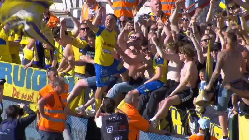 Opluchting bij Kanaries na redding in Guldensporenstadion