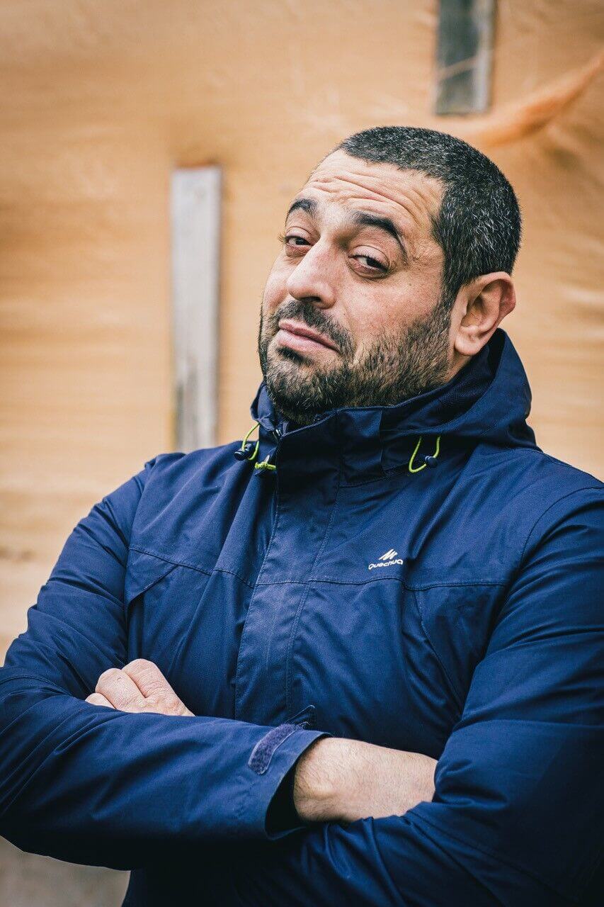 <b><i>Erhan Demirci</i></b>